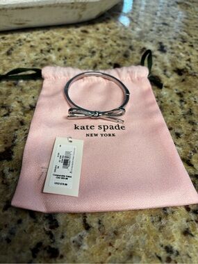 kate spade New York Silver Bow Bangle Bracelet - Pink Pouch